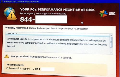 A computer screen showing a scam or security warning.