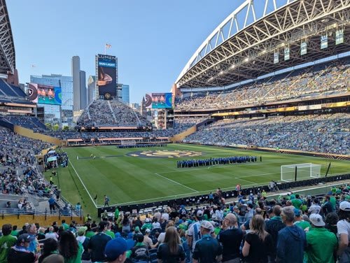 A soccer match in a stadium.